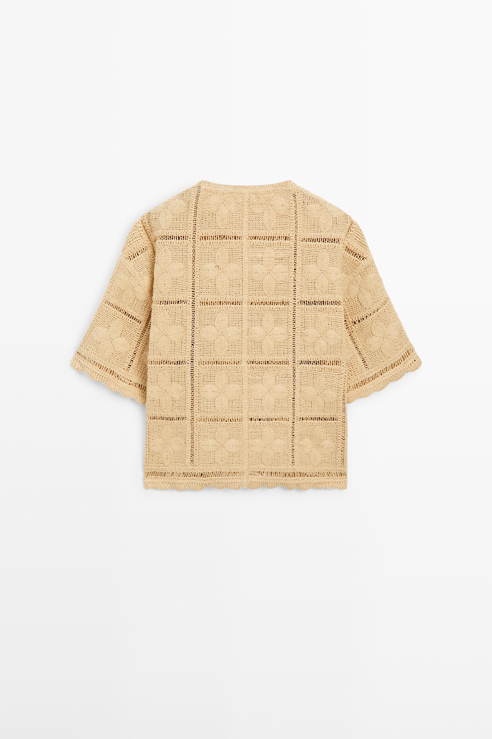 Veste en maille ajourée et crochet